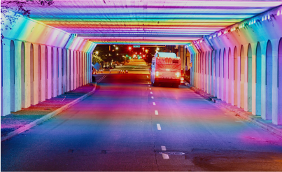 bus in a colorful road tunnel